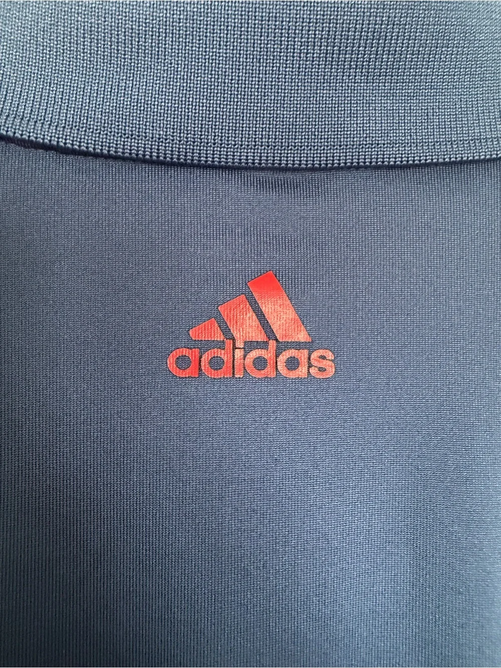 adidas Blue Polo Shirt with Red Sleeve Stripes